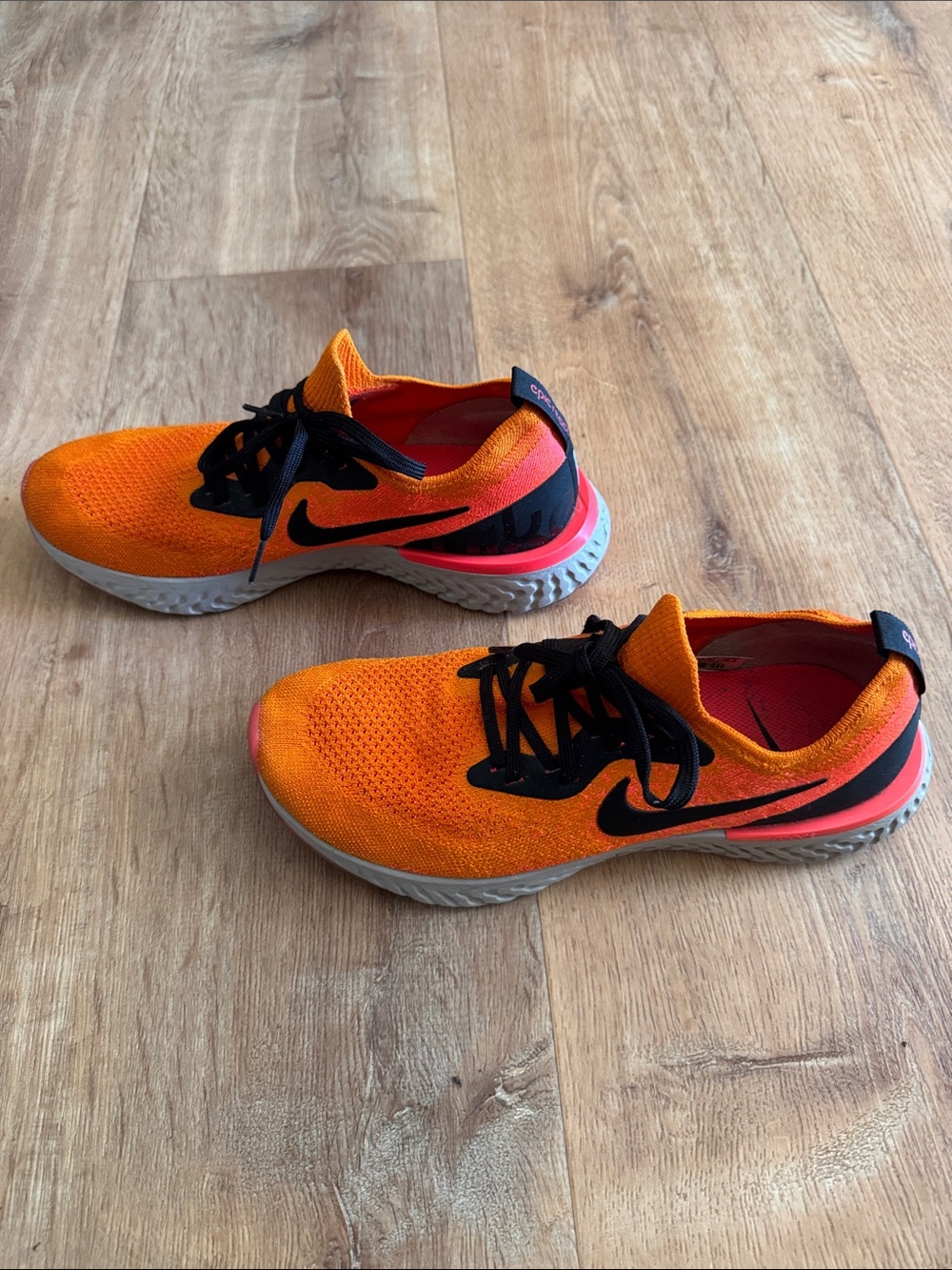 Nike Women’s Bright Orange Knit Sneakers with Black Details